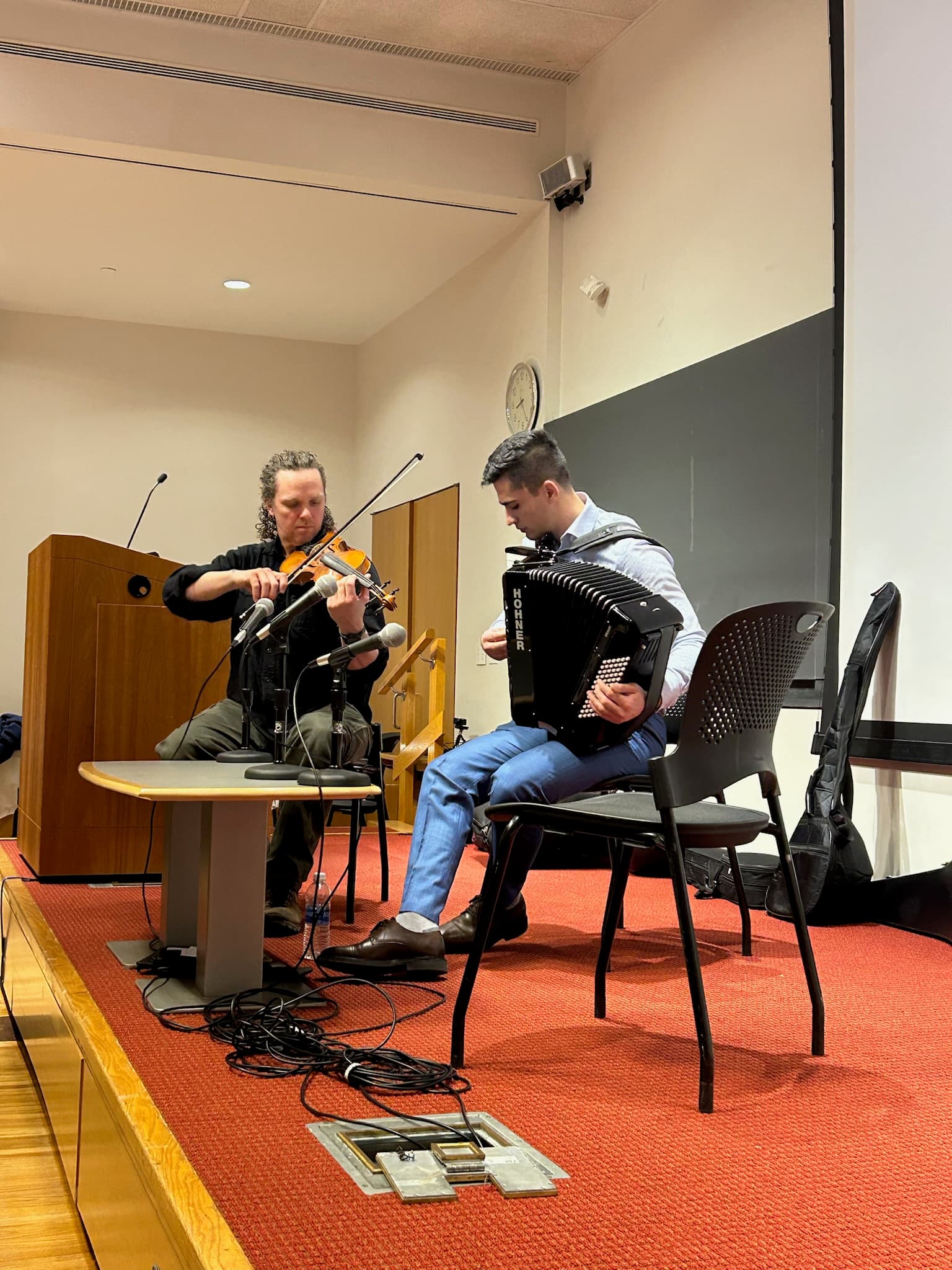 Live musicians performing at an OFAS cultural program.
