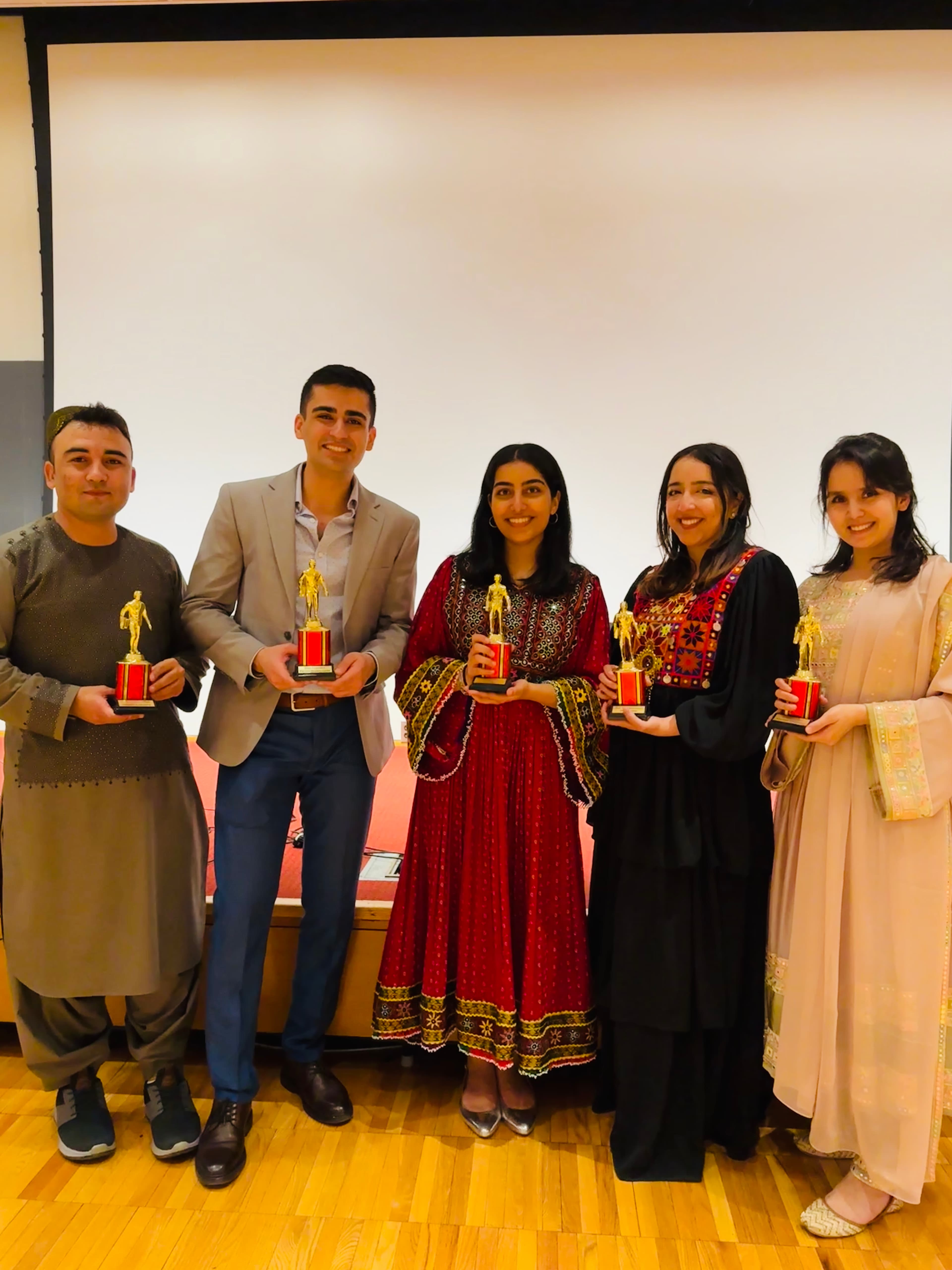 Award recipients posing together at an OFAS event.