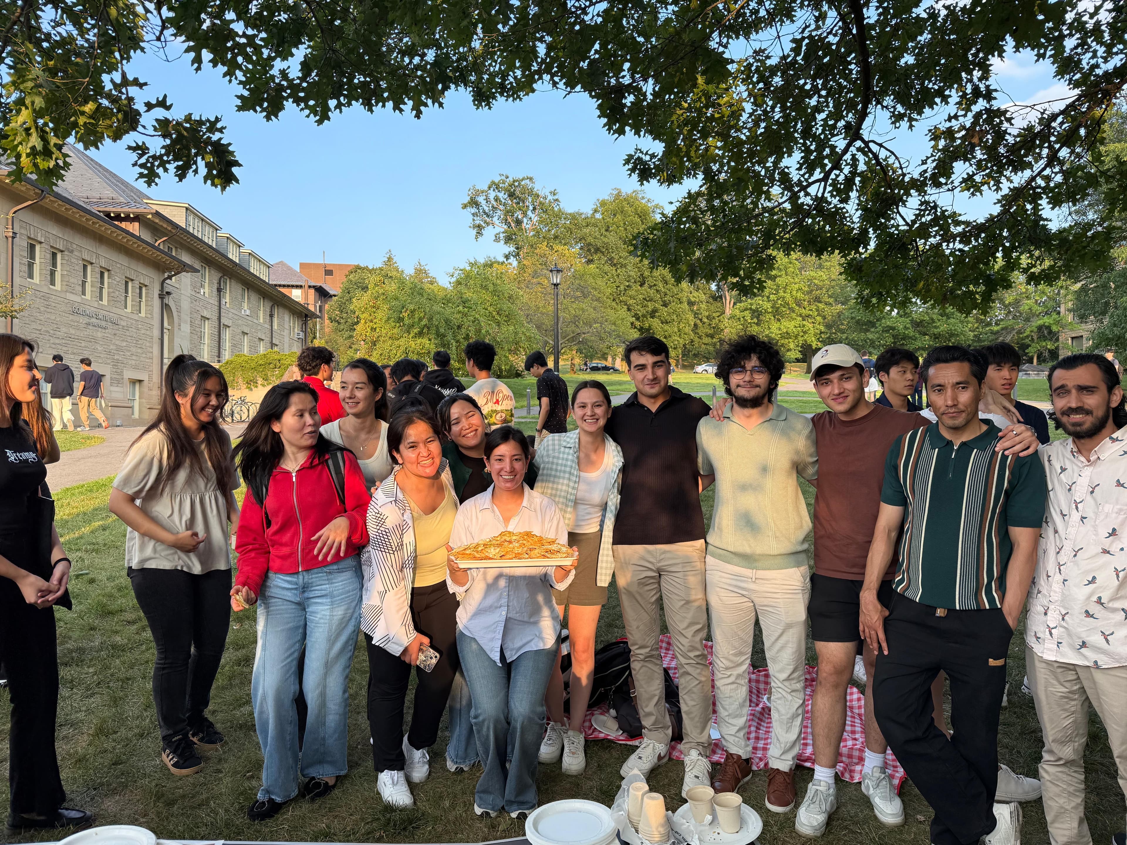 Students gathered outdoors during an OFAS barbecue.